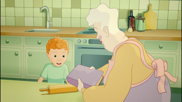 Kadr z filmu animowanego: chłopiec przy stole kuchennym z babcią