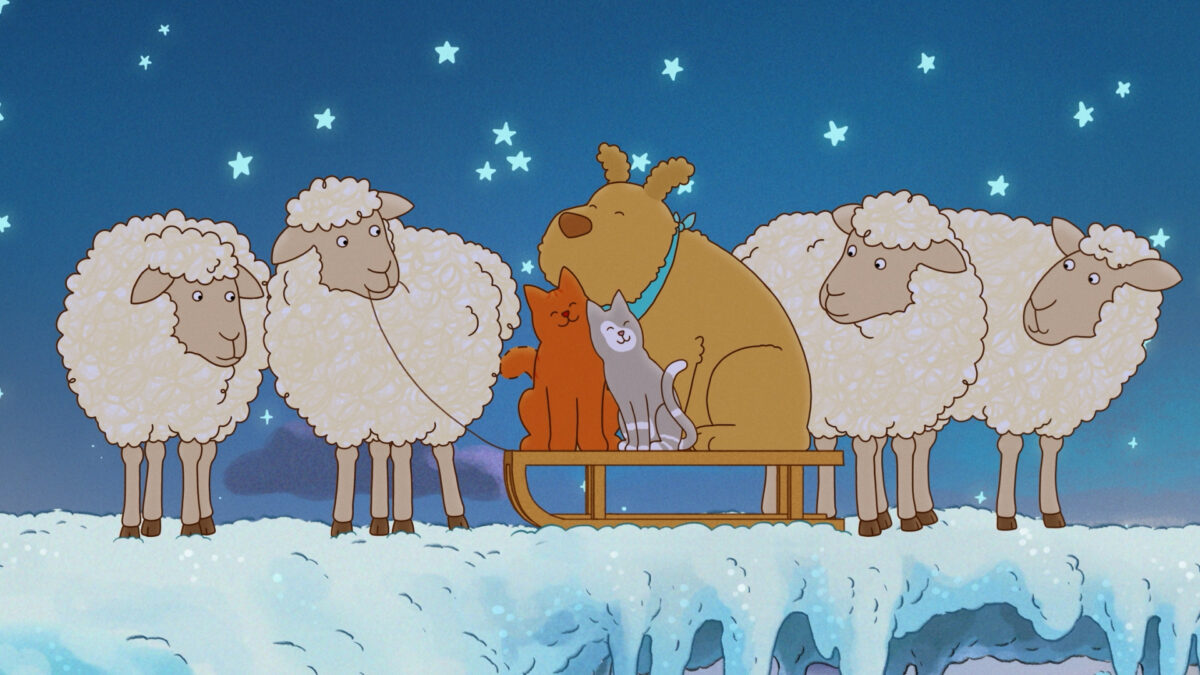 Dwa koty i pies siedzą na sankach, które ciągną dwie owieczki