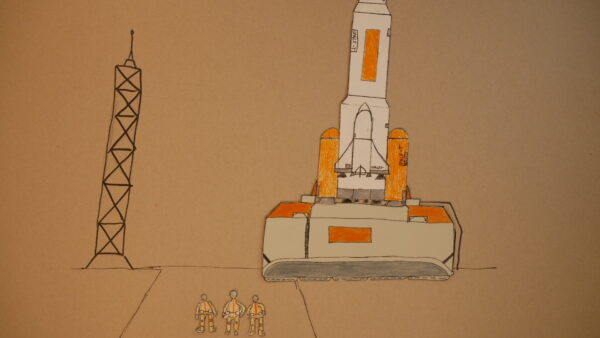 Kadr z filmu animowanego, narysowana rakieta stoi na platformie startowej obok wysokiej wieży, a przed nią znajdują się trzy małe postacie astronautów