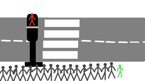 Kadr z filmu animowanego, prosty rysunek przejścia dla pieszych z sygnalizatorem pokazującym czerwone światło oraz rzędem postaci stojących przed pasami.