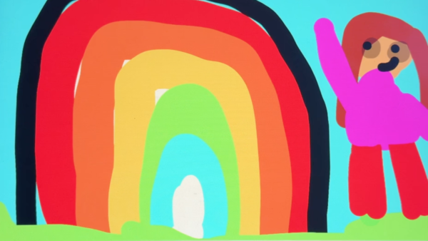 Kadr z filmu animowanego, kolorowa postać stoi obok dużej tęczy na tle jasnoniebieskiego nieba i zielonej trawy.